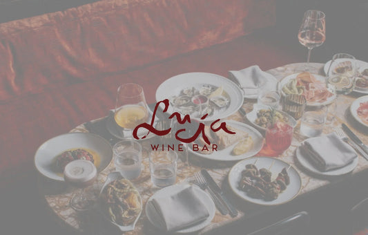 "Wine, Dine, and Fall in Love: A Romantic Candlelit Evening at Bar Lucia awaits"